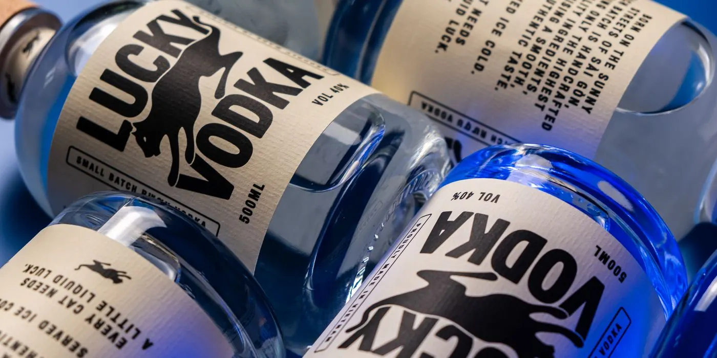 Lucky Vodka bottles under blue light