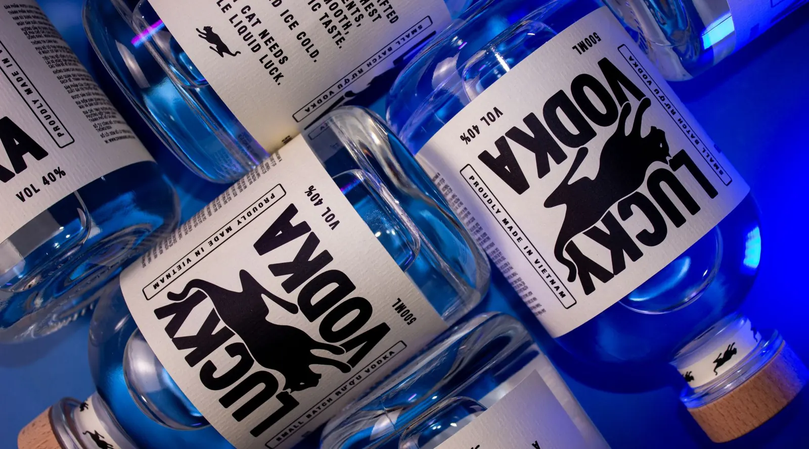 Lucky Vodka bottles under blue light